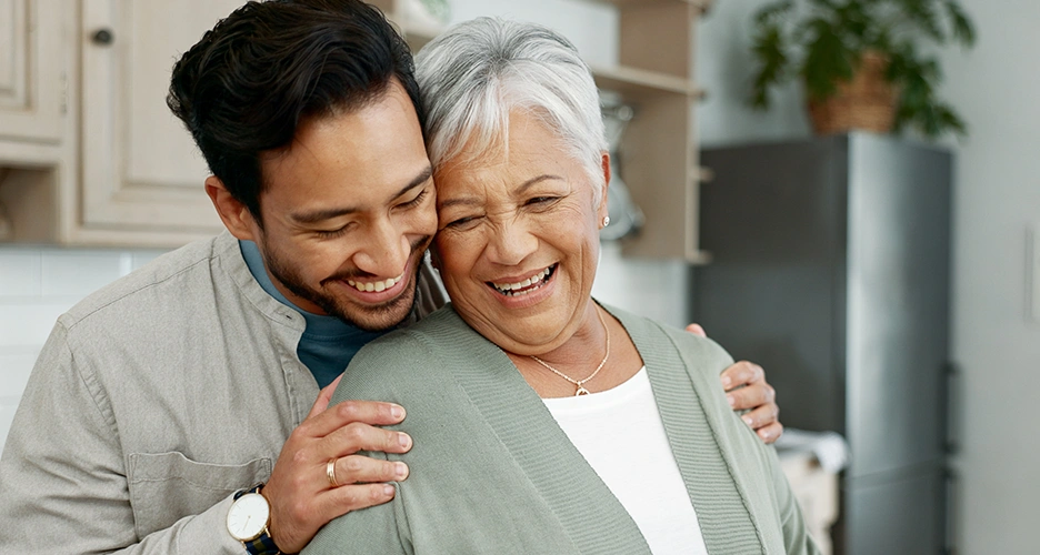 Son hugging mother